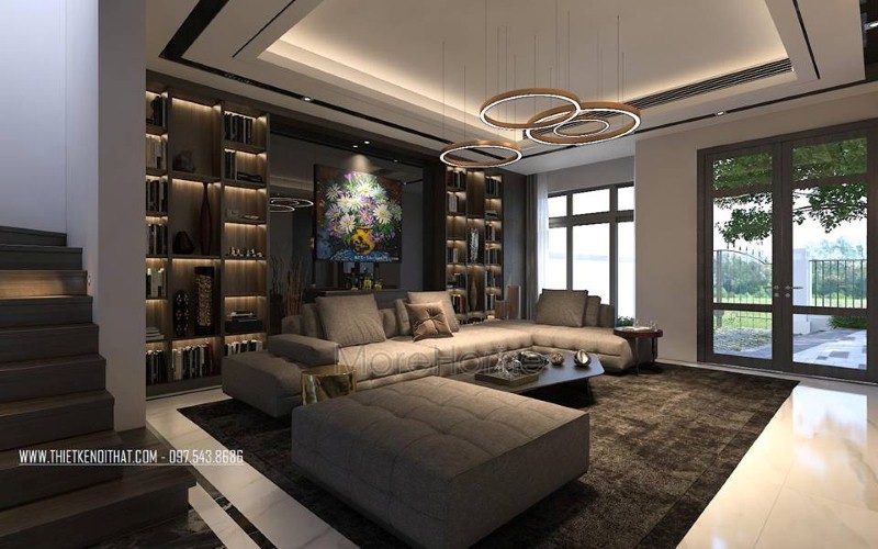 Sắp xếp nội thất phòng khách biệt thự, nhà phố sử dụng sắc trầm chủ đạo nhưng vẫn tạo nên không gian thông thoáng bởi hệ cửa kính rộng thông thoáng. thiết kế nội thất phòng khách